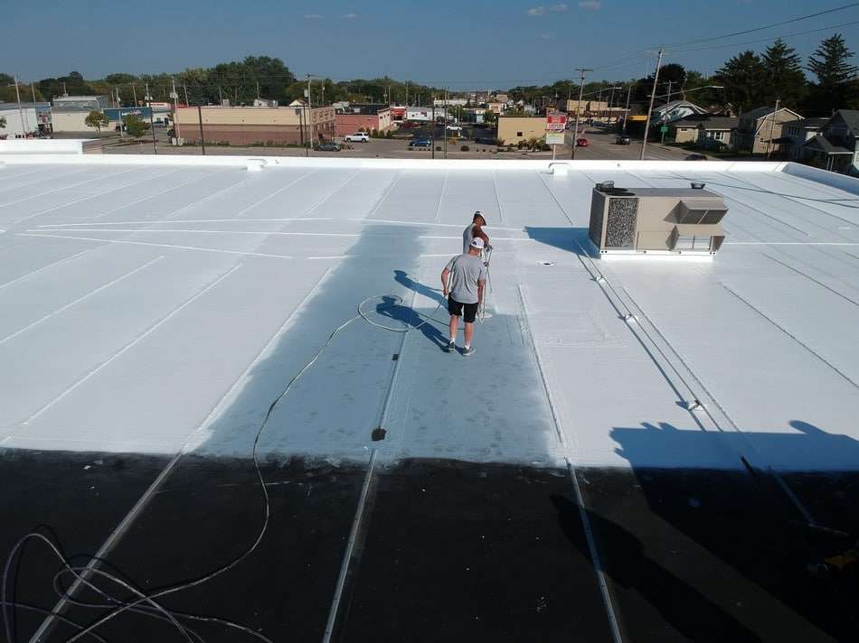 Membrane restoration work in progress showing professional application techniques and quality workmanship by Roof Tech LLC